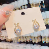 Gold Tone Halo Crystal Earrings