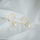 gold-toned hoop earrings