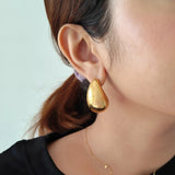 Bold Wave Golden Earrings