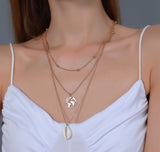 Multilayered Globe Shell Neckpiece